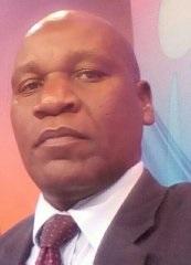 Prof. Hezron Mogambi